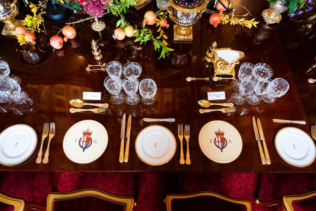 Pomegranate from the Windsor Castle gardens form part of the floral decorations at the place settings for the banquet (Aaron Chown/PA)