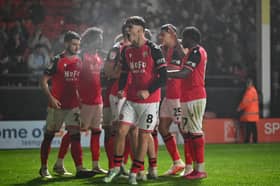 Walsall extended their unbeaten league start with a 3-0 win over Oldham.