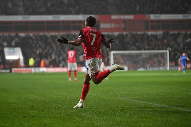 Sodje celebrating the Saddlers' opening goal.
