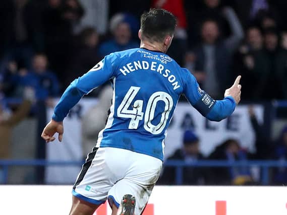 Ian Henderson celebrates