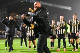 Stafford Rangers boss Graham Deakin celebrates after the famous FA Cup win