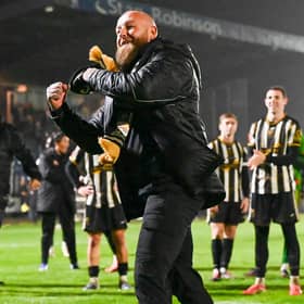 Stafford Rangers boss Graham Deakin celebrates after the famous FA Cup win