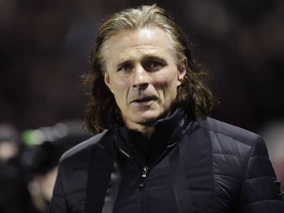 Gareth Ainsworth looks on