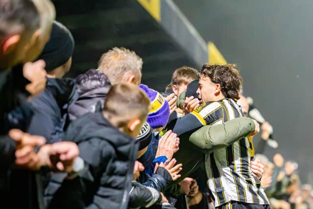 Scott Bakkor celebrates Stafford Rangers’ famous FA Cup win. Pic: Pete Wideman