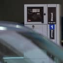 Fuel prices are shown on the pump at 299.9p per litre of diesel