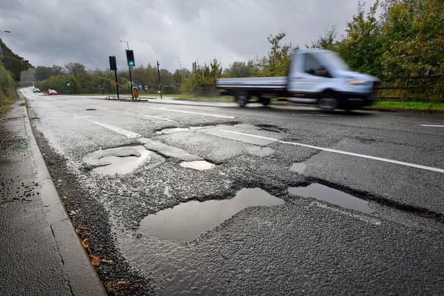 Bad potholes at the junction of Gospel End Road and Brick Kiln Way, near Baggeridge Village are causing problems for drivers.
Tim Thursfield/Iconic Media Group