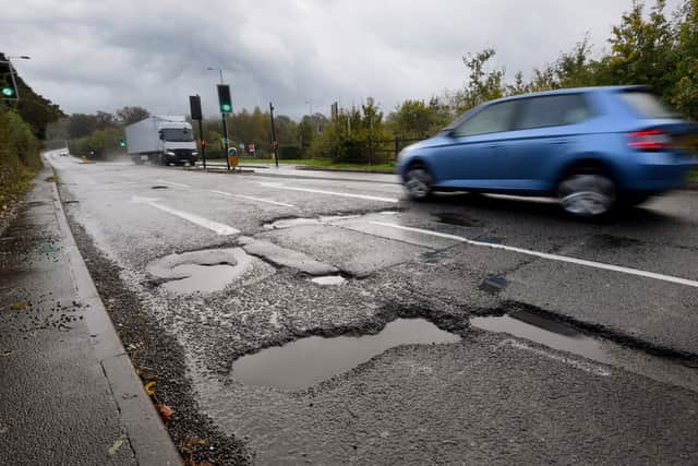 Bad potholes at the junction of Gospel End Road and Brick Kiln Way, near Baggeridge Village are causing problems for drivers.
Tim Thursfield/Iconic Media Group