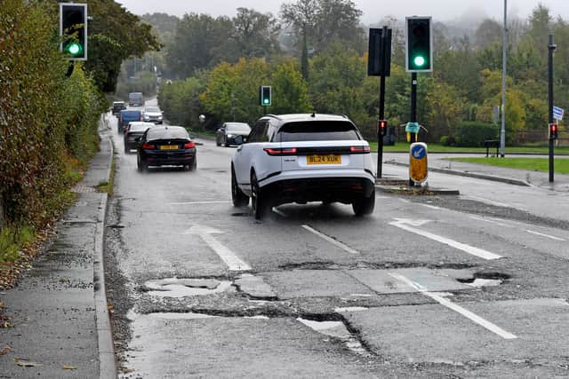 Bad potholes at the junction of Gospel End Road and Brick Kiln Way, near Baggeridge Village are causing problems for drivers.
Tim Thursfield/Iconic Media Group