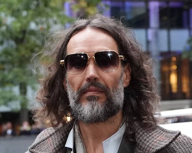Russell Brand outside court