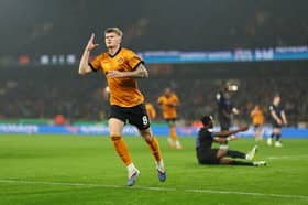 Jordan James celebrates scoring for Wolves against Portsmouth on Tuesday