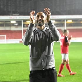 Walsall head coach Lee Grant celebrates their win over Oldham on Tuesday.
