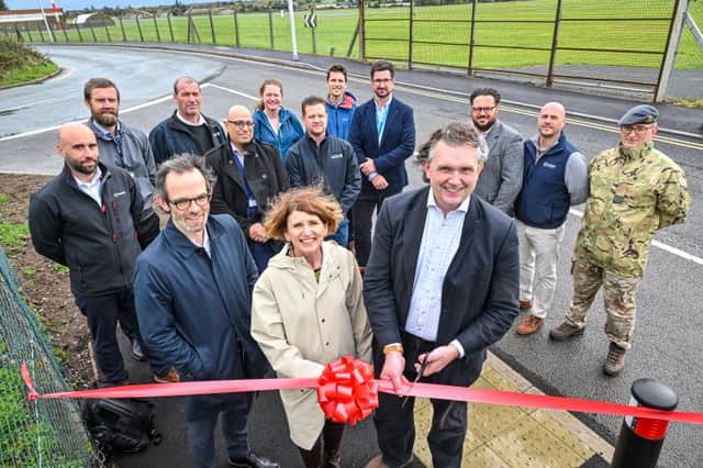 Representatives from Shropshire Council and the project partners cut a ribbon to officially open the new path