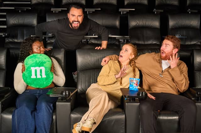 Unsuspecting moviegoers surprised by Rylan were given free treats and cinema tickets