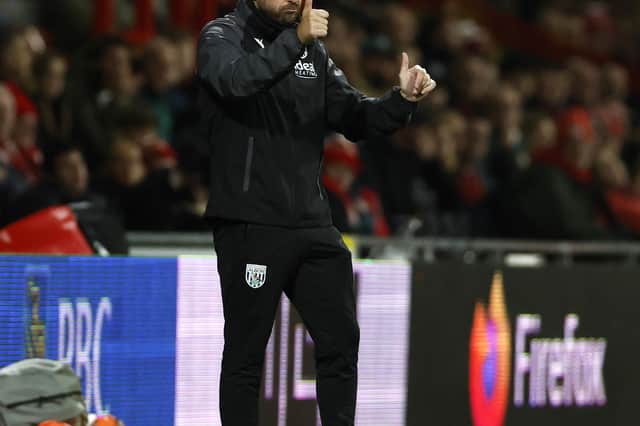 Thumbs-up from the head coach during the recent comeback win at Wrexham.