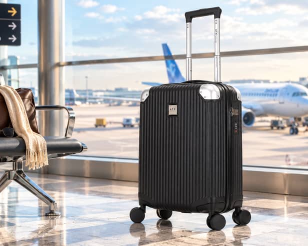 The ATX Luggage 21-inch hard-shell cabin suitcase has a 33-litre capacity, four dual spinner wheels and a built-in three-digit lock.