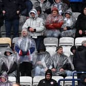 Albion fans brave the weather at Preston