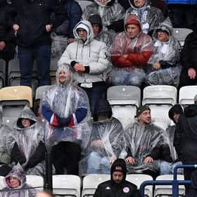 Albion fans brave the weather at Preston