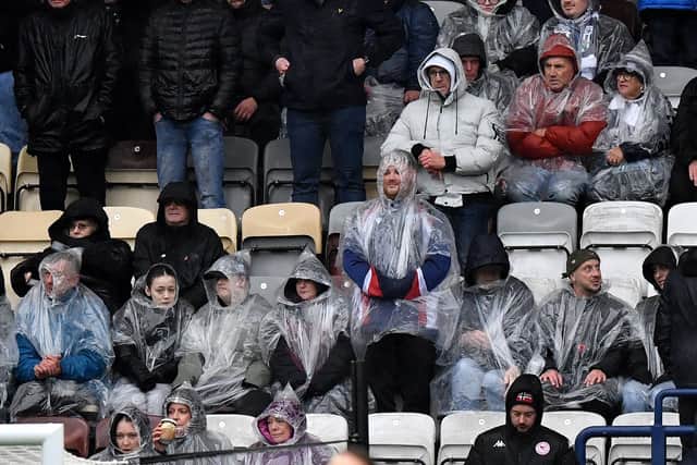 Albion fans brave the weather at Preston