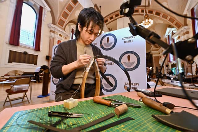 Hin Tang from Walsall Leather Skills does a demonstration at the expo