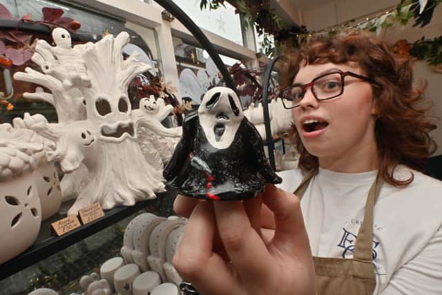 The hunt has been organised by Evers So Creative pottery painting studio. Manager, Ella Watson with one of the ghosts.