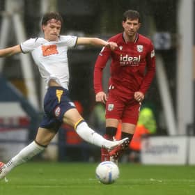 Albion’s Chris Mepham in action in the Preston rain.

Photographer Rich Linley / CameraSport


