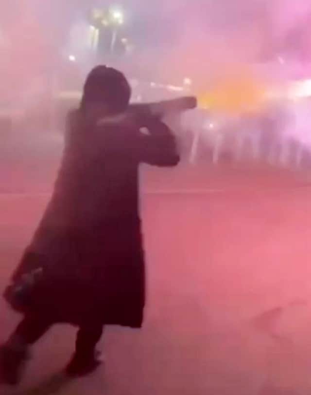 This is the shocking moment the streets of Birmingham were turned into a 'scene like Star Wars' after a yob went on the rampage with a firework 'gun'.