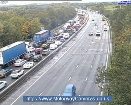 The northbound carriageway was left at a standstill after the collision. Photo: Motorway Cameras