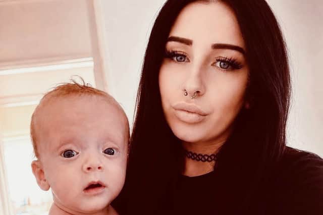 Laura with baby Samson.