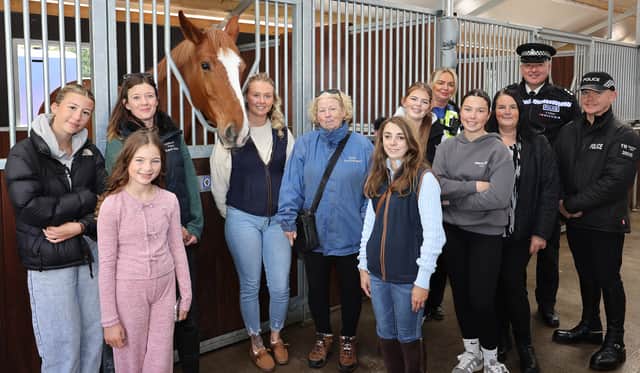 Members of the Sugarloaf Equestrian Centre with Back left to right, PCSO Helen Denyer, Bryn Robins, Chief Inspector of Local Policing for Dudley and PC Will Smith (Mounted Unit)