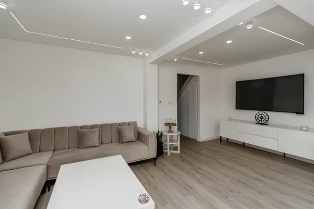 The versatile reception room offers buyers the option of a traditional living space, a home office, a playroom or a potential fourth bedroom.