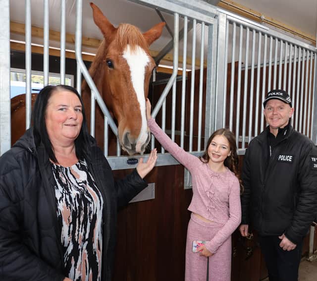 Freya Adams (12) and nan Sharon Gibbons with PC Will Smith (Mounted Unit)