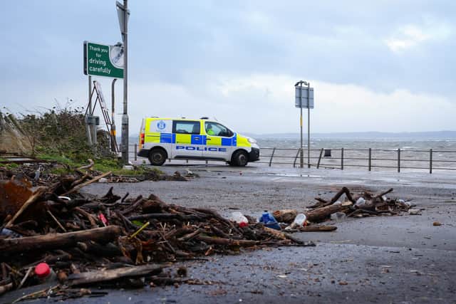 A police van blocks the road near Skelmorlie in North Ayrshire after Storm Boelo (Jane Barlow/PA)