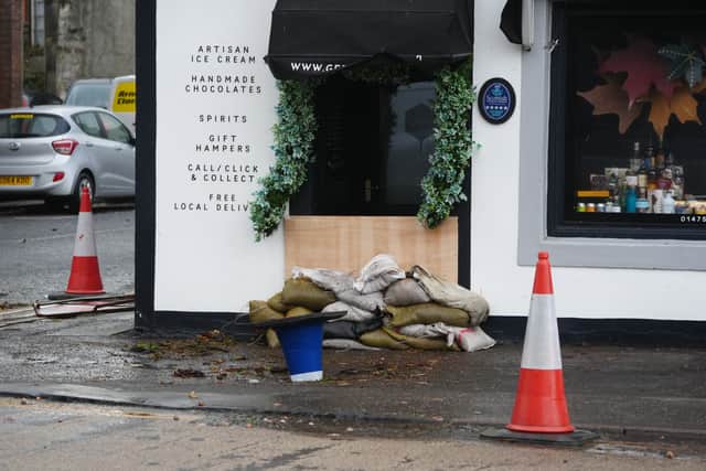 Sandbags outside shop doorways in Largs after Storm Boelo passed (Jane Barlow/PA)