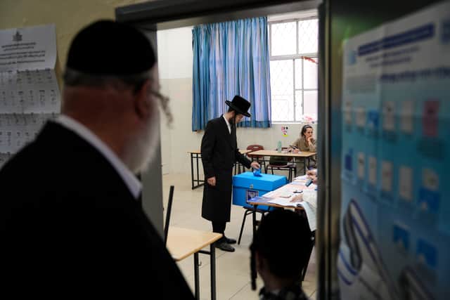 More than seven million people are eligible to vote (Baz Ratner/AP)
