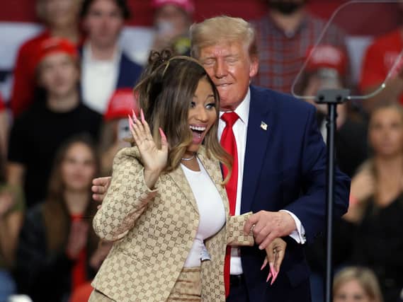 Nicki Minaj waves alongside US President Donald Trump