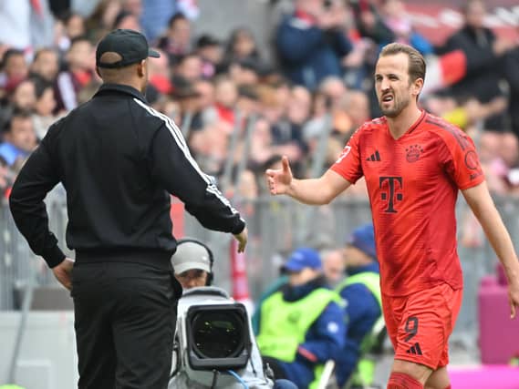 Bayern Munich manager Vincent Kompany (left) and Harry Kane (right) at the Allianz Arena