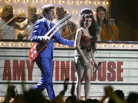 Mark Ronson and Amy Winehouse on stage at the Brit Awards in 2008