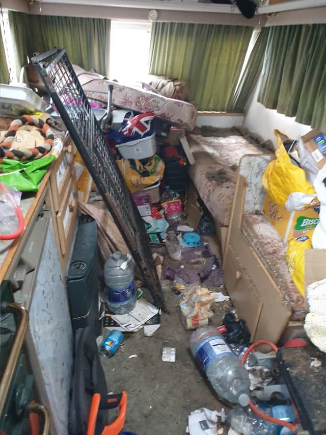 Inside the caravan where a number of dogs were kept.