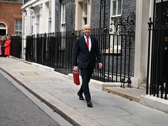 John Healey walking down Downing Street carrying his ministerial red box