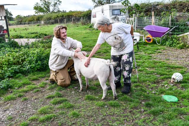 (L-R) Carter Chivers, animal carer and charity founder Carole Webb.