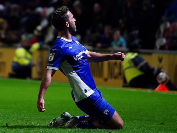 Will Grigg celebrates