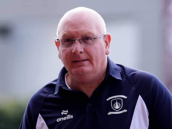 John McGlynn before a game