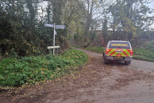 Police at the east end of Sheep Walk Lane near Kinver where a burnt-out car with a body inside was found