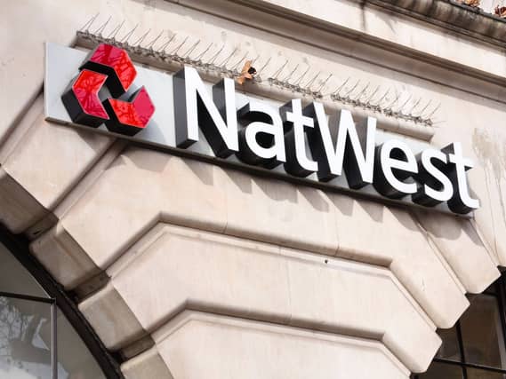 A NatWest sign outside a bank branch