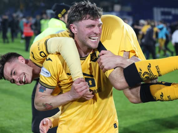 Livingston forward Robbie Muirhead, bottom