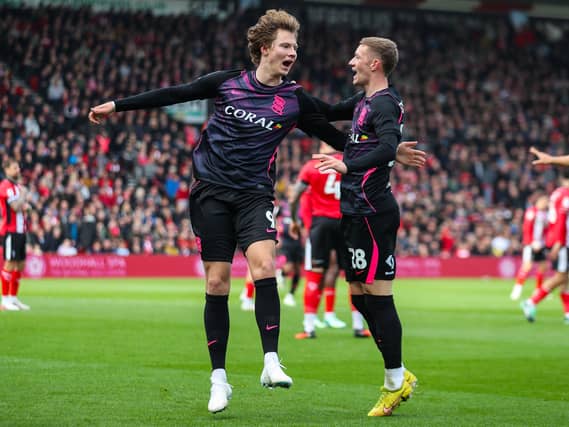 Birmingham’s August Priske (left) celebrates scoring