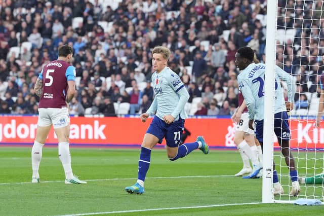 Jimmy-Jay Morgan tucks in a lovely second goal for his side.