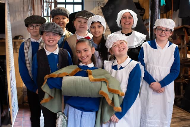 Pupils from New Invention Learning Academy meet Sister Dora (played by Hayleigh Power) at Walsall Leather Museum.