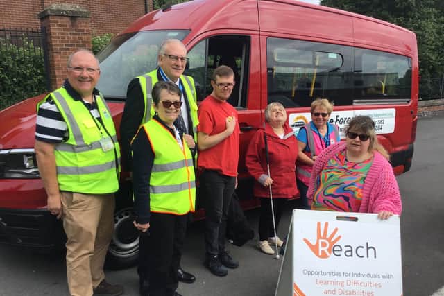 High Sheriff Maynard Burton (third right) and his wife Caroline with volunteers Peter and Liz Simner and their Reach passengers