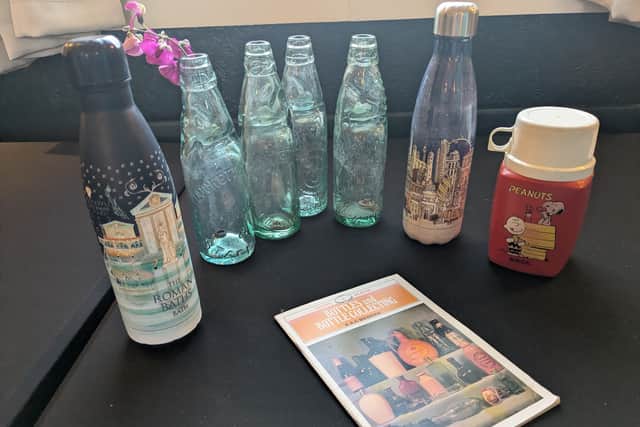 Members brought in interesting water bottles from home